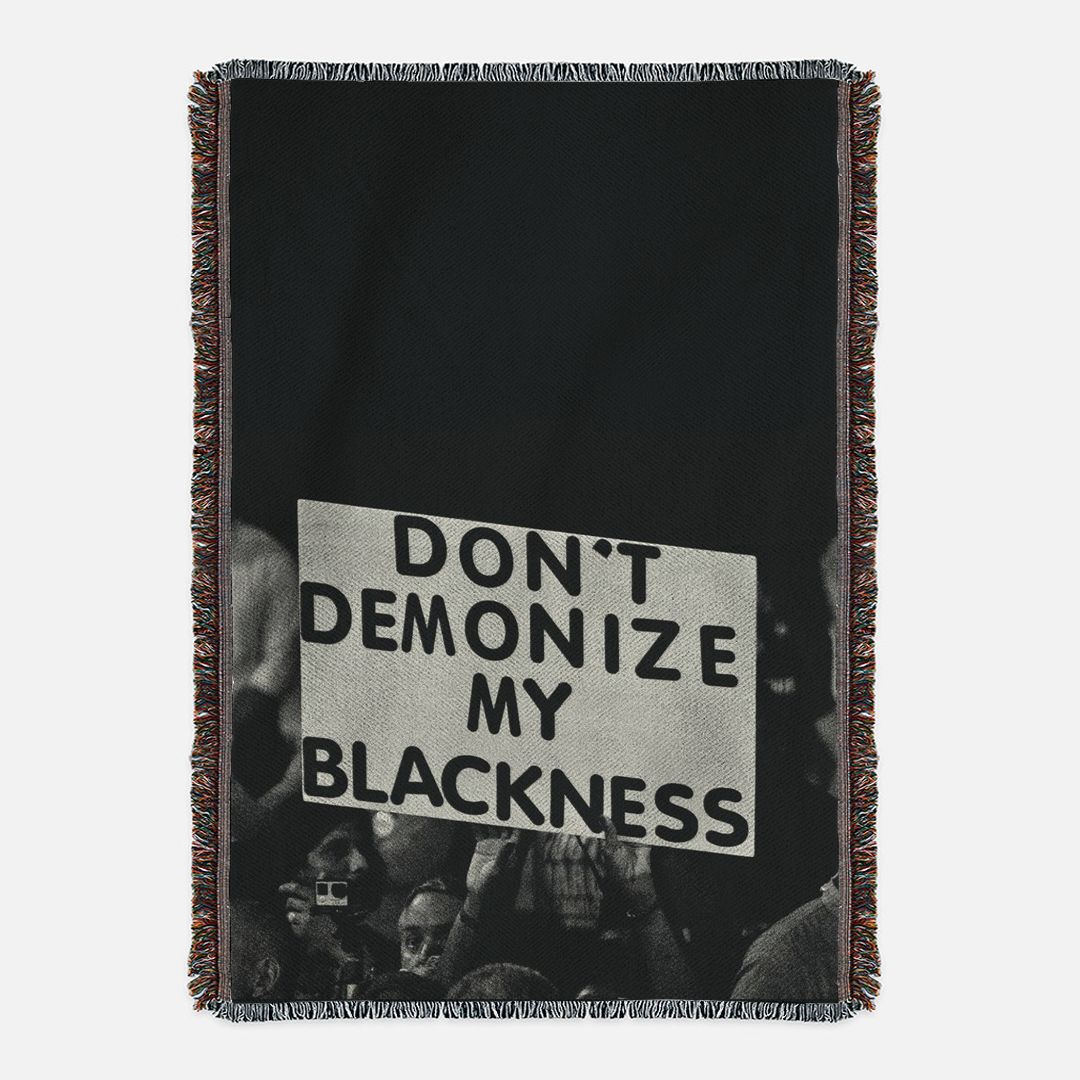 Don't Demonize My Blackness Woven Blanket